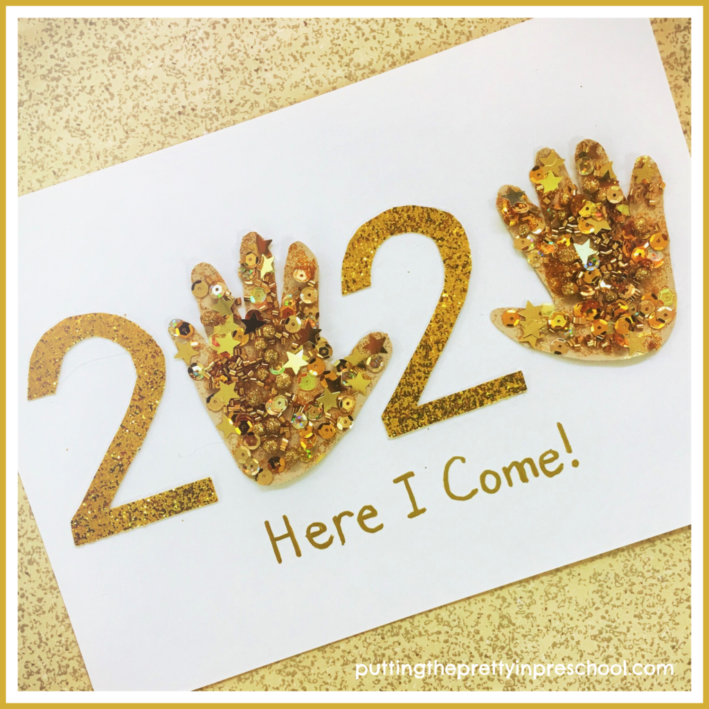 Glitter paper and gold collage items are front and center in this 2020 handprint art activity. An easy to make New Year's keepsake suitable for children of all ages.