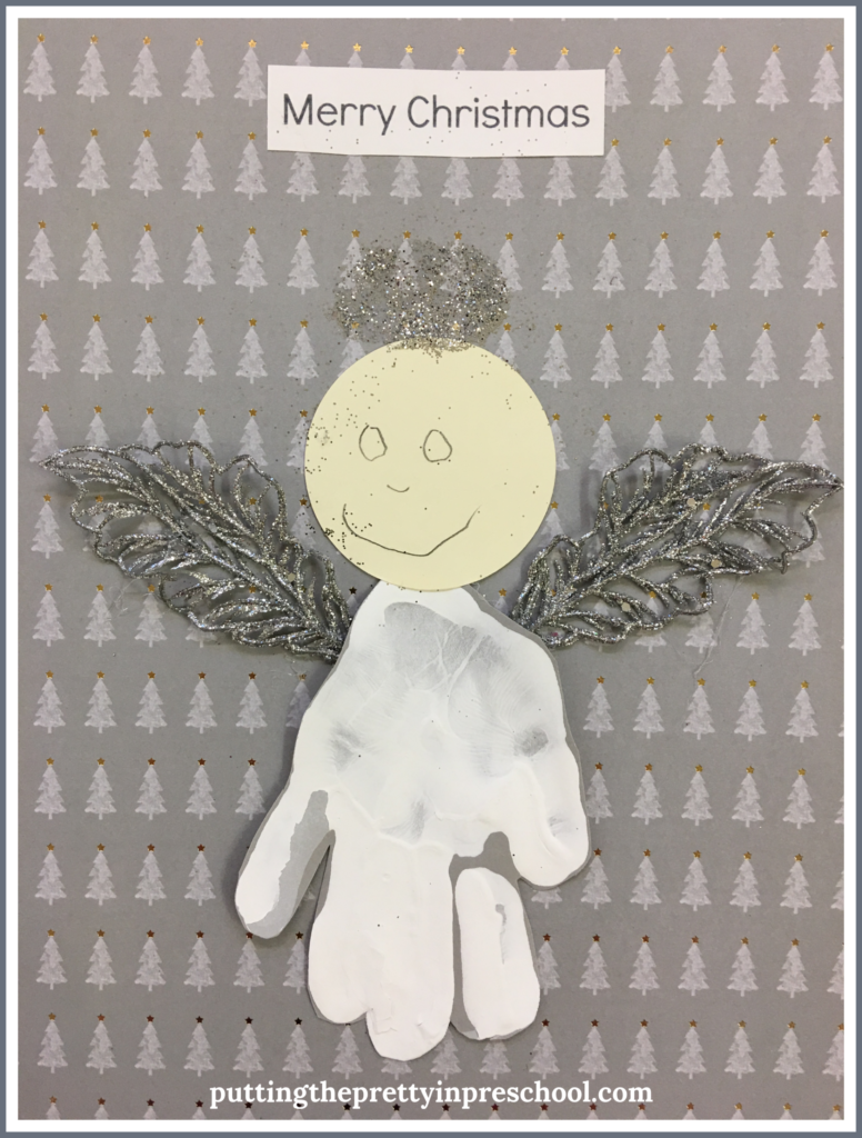 A handprint angel craft with the caption "Merry Christmas." An easy to make keepsake all children can create.