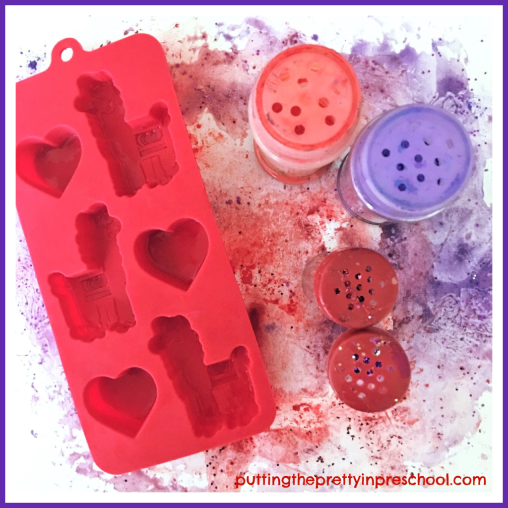 Valentine's Day process art supplies for an ice cube and powder paint technique. Llama shaped ice cubes give the project a South American flair. An art project suitable for all ages.