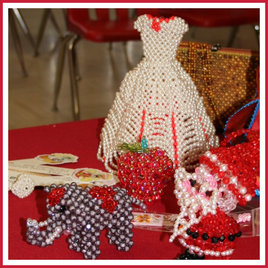 Bead work projects on display at a Chinese Valentine's Day celebration.