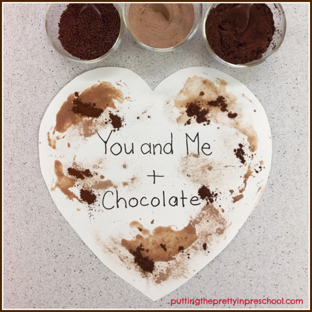 Cocoa and hot chocolate added to a heart shape. Ice cubes can be used to swish the powders around.