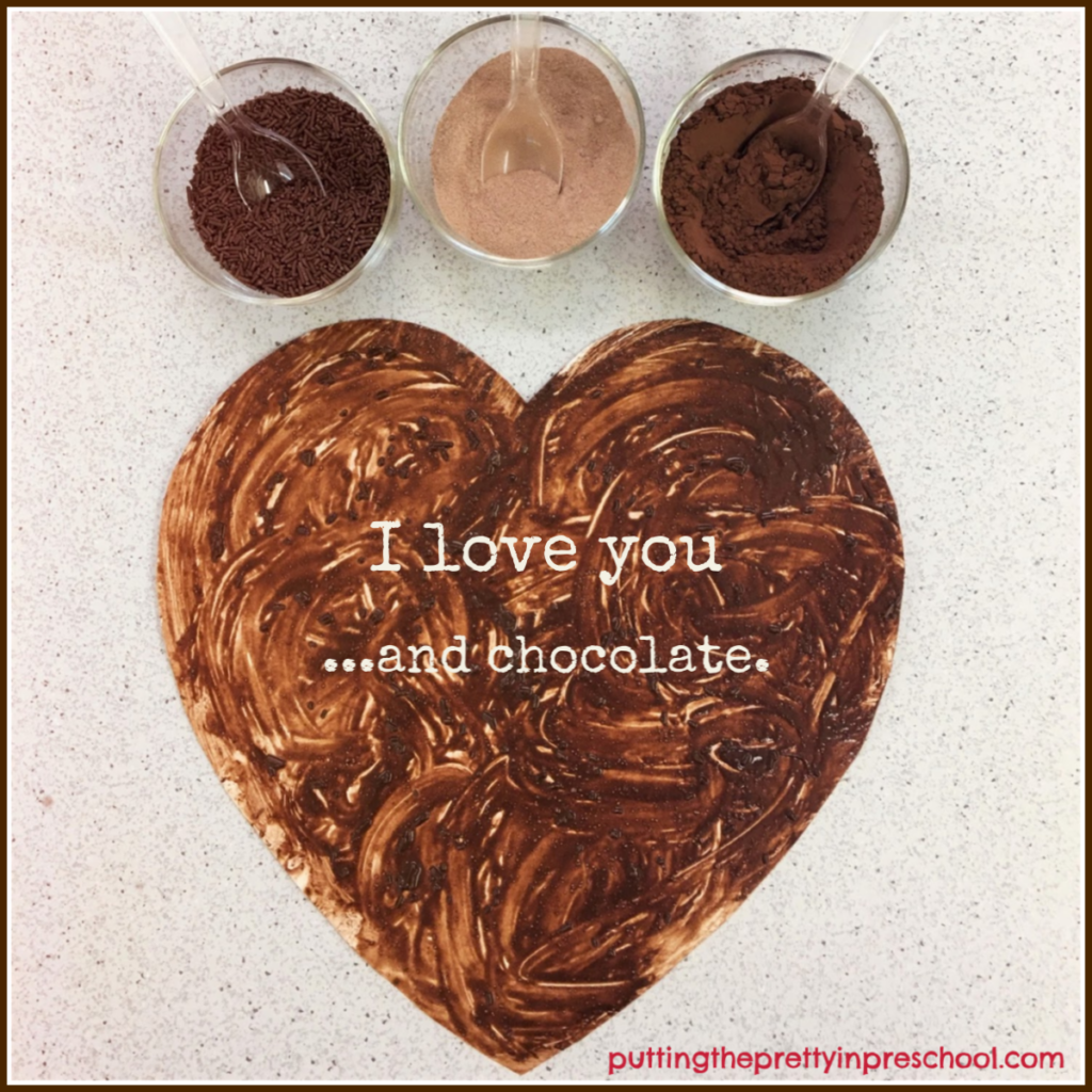 Fingerpainting with water added to hot chocolate powder and cocoa. Chocolate sprinkles can be included in the mix.