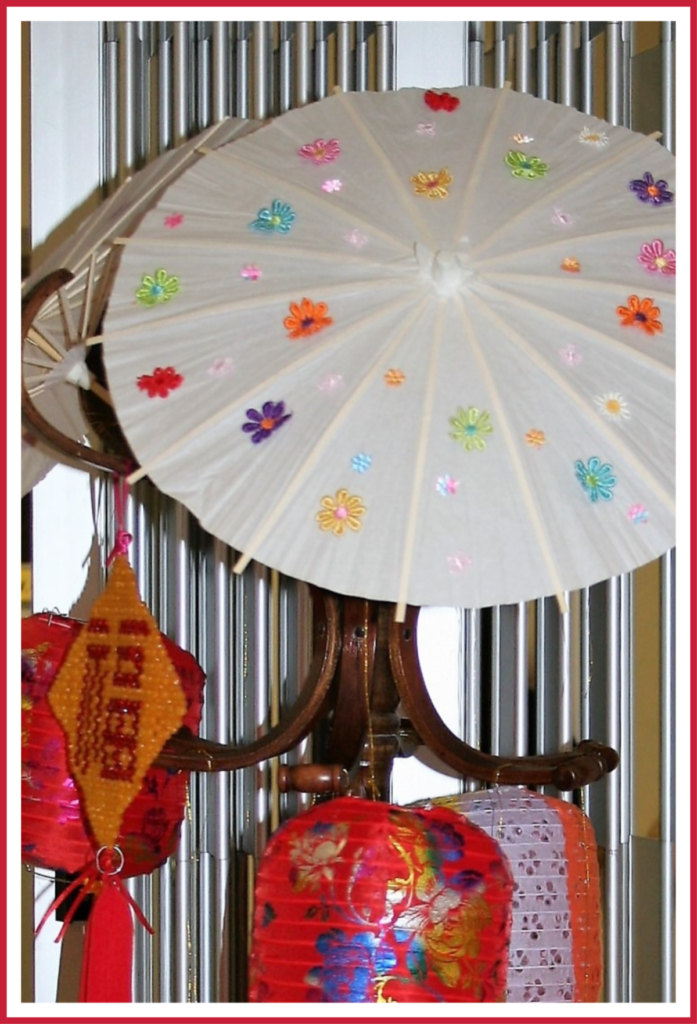 Lanterns and decorated umbrellas at a Chinese Valentine's Day celebration.