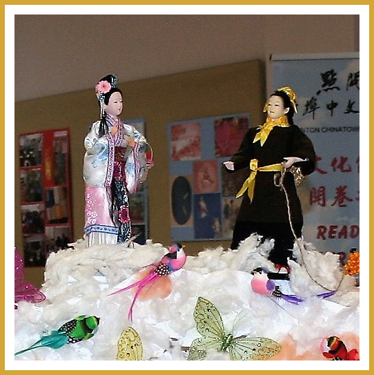 A display featuring characters inspired by The Legend Of Zhi Nu and Niu Lang. Chinese Valentine's Day celebrations are based on this story.
