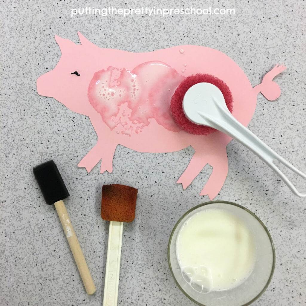 Decorate Wilbur Pig with buttermilk "paint." An art activity inspired by the storybook "Charlotte's Web."