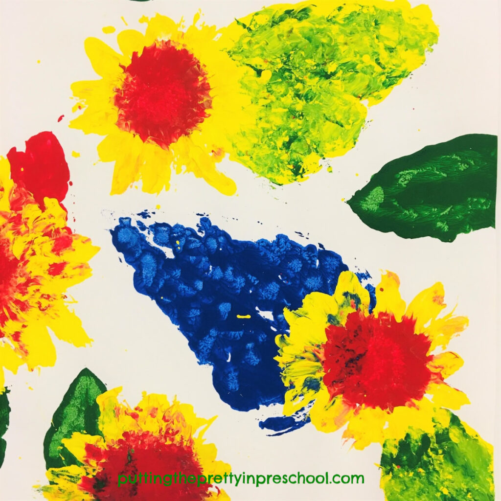 Paint prints with sunflowers. Tempera paint and primary colors used with leaves and heads of sunflowers. This is an all-ages activity.