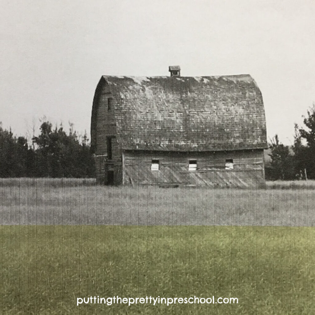 Country barn photo enhanced with a strip of a transparent page divider..