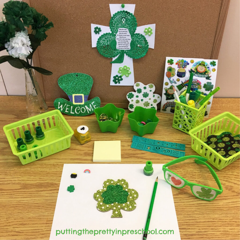 St. Patrick's Day writing center with office supplies. Themed tracers, stickers rulers, rubber stamps, erasers, hole punches, and writing papers are included.