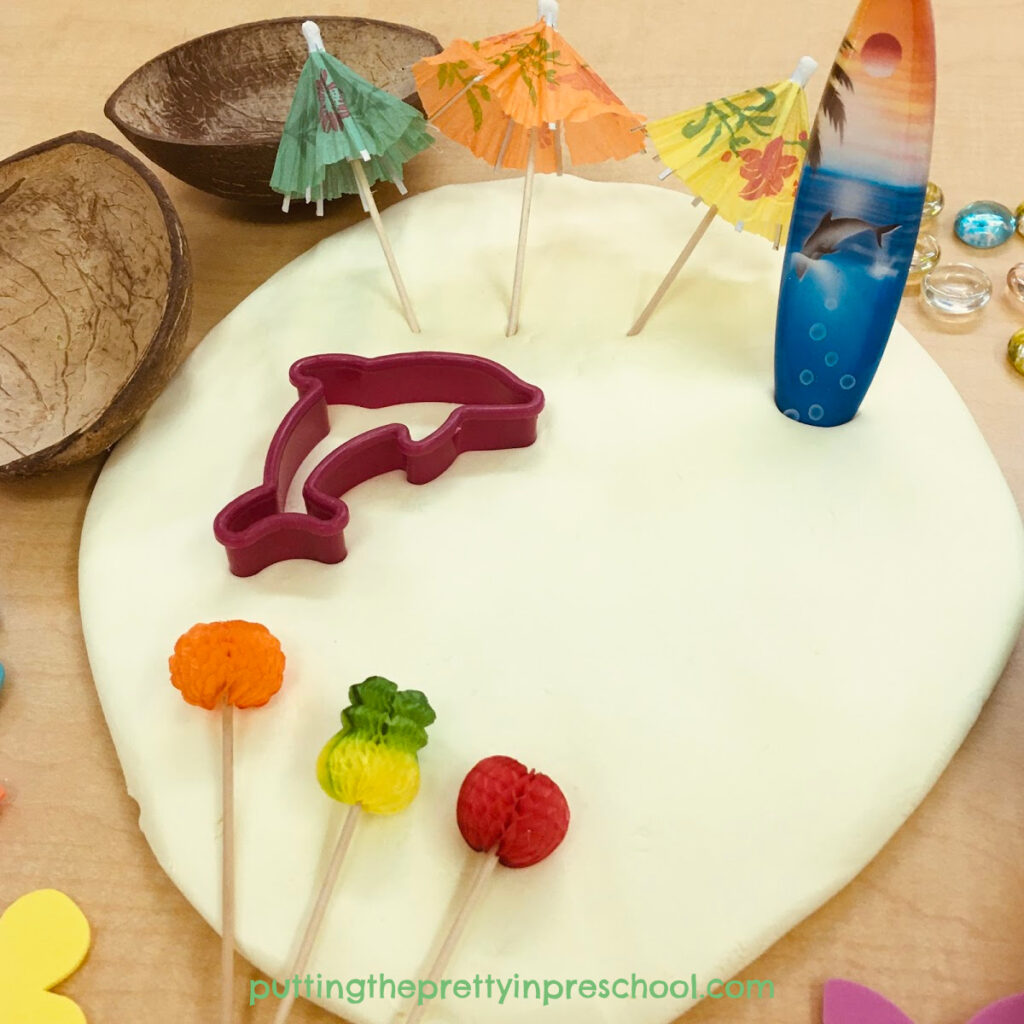Invitation to explore scented, two-ingredient playdough with tropical-themed accessories.