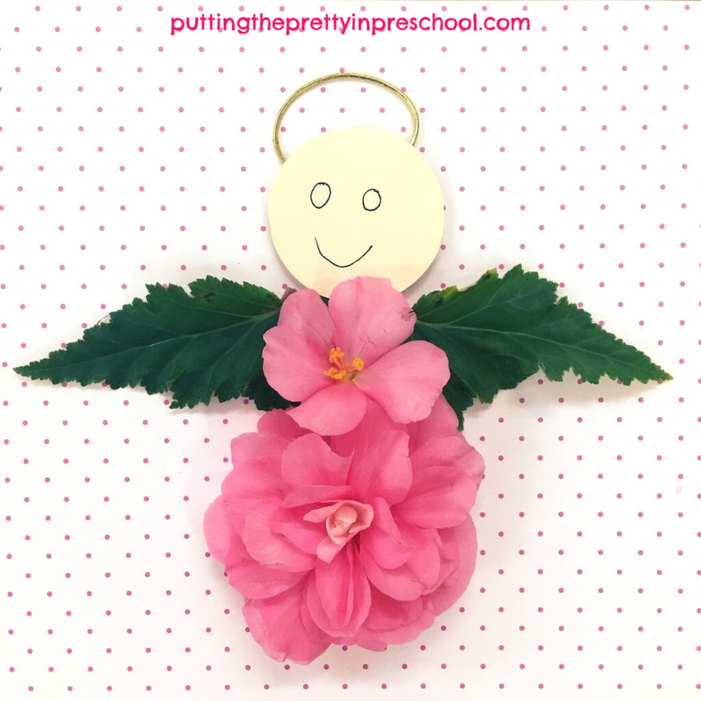 Flower angel made with nonstop pink begonia blooms.