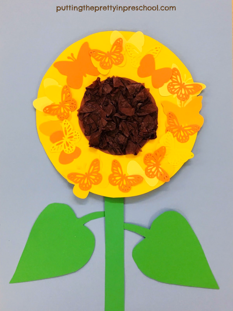 Easy to make butterfly sunflower papercraft. The sunflower head has a scrunched tissue center surrounded by paper butterflies.