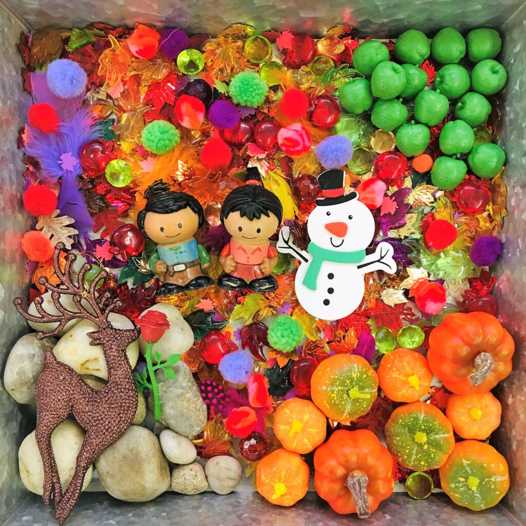 Fall sensory bin inspired by the Frozen 2 based storybook "We'll Always Have Each Other."
