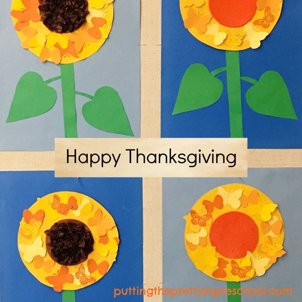 Happy Thanksgiving bulletin board display with butterfly-themed paper sunflowers.