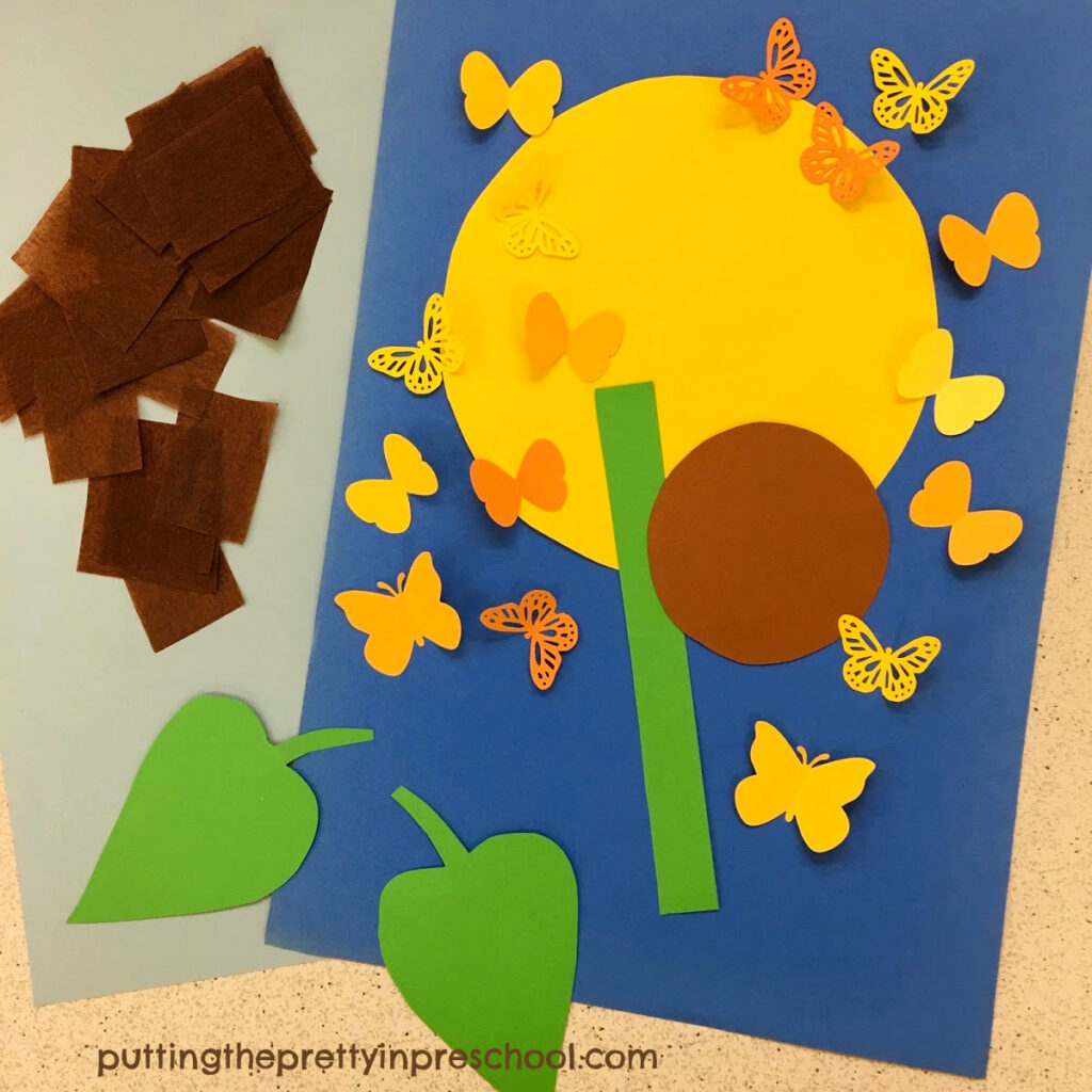 Paper supplies needed to make a butterfly-themed sunflower craft.