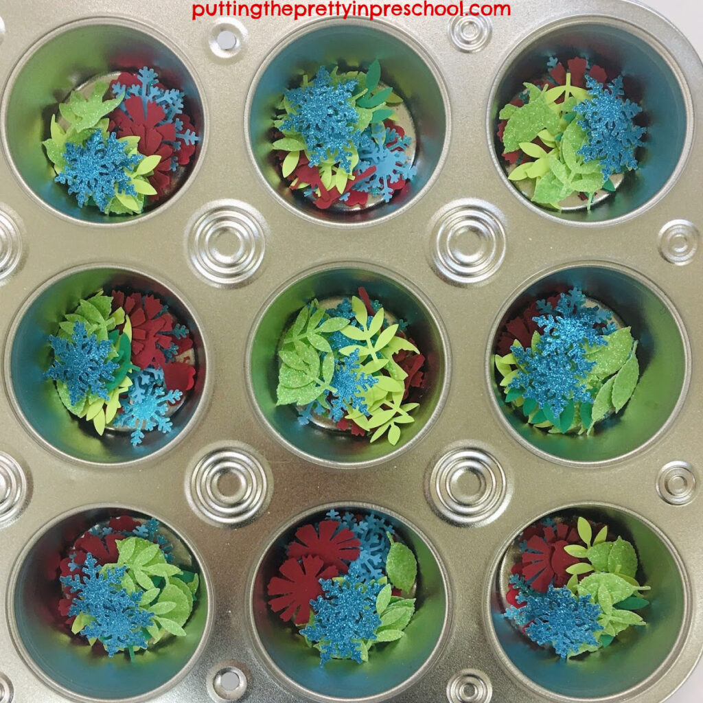 A twelve cup muffin pan works well as a shape sorter for group art.