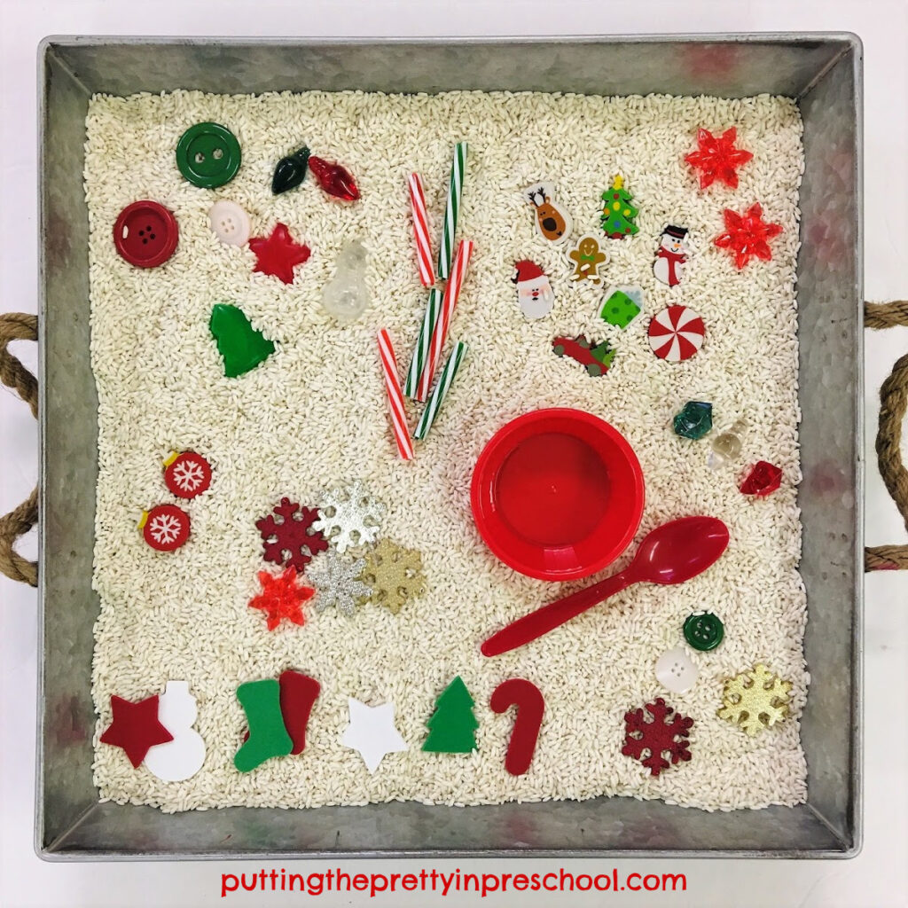 Christmas-themed rice sensory tray.