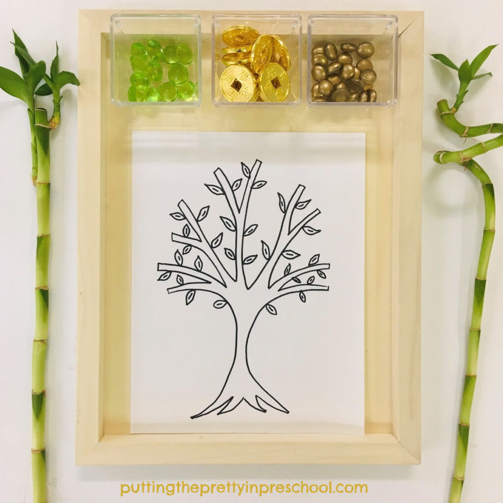 Invitation to decorate a Chinese money tree with gold coins and acrylic gems.