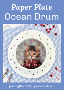 This DIY paper plate ocean drum can be personalized with a picture of your cherished pet.