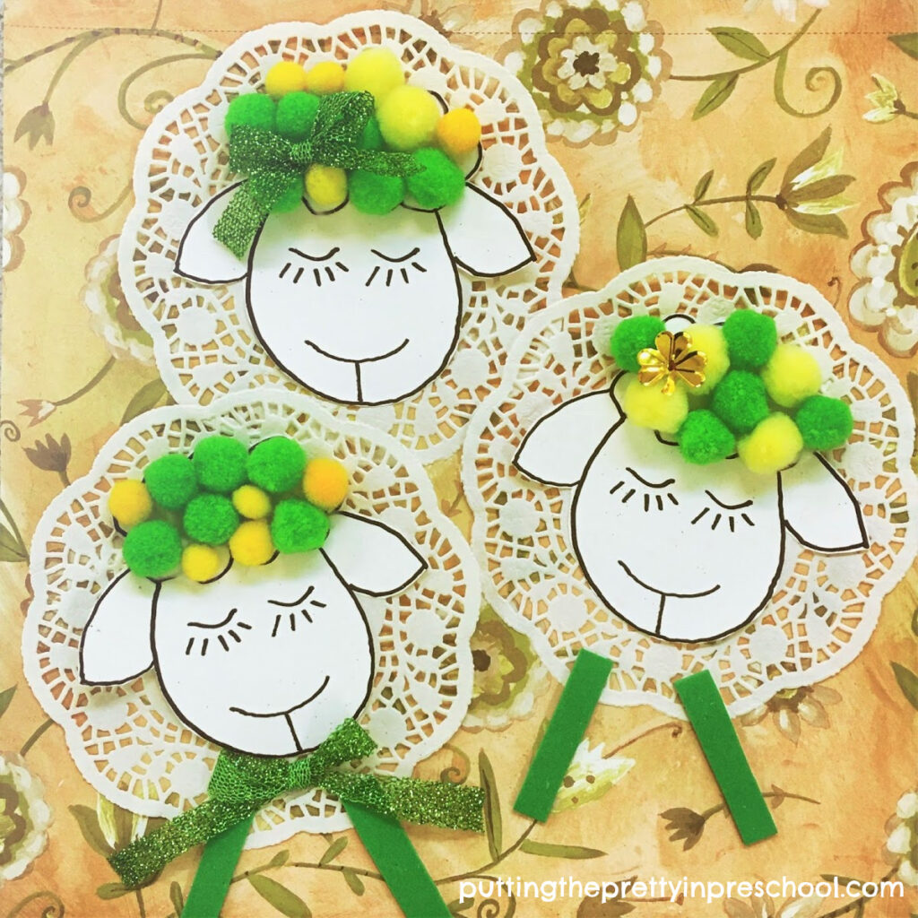 Sweet doily and pompom sheep craft perfect for St. Patrick's Day or spring.