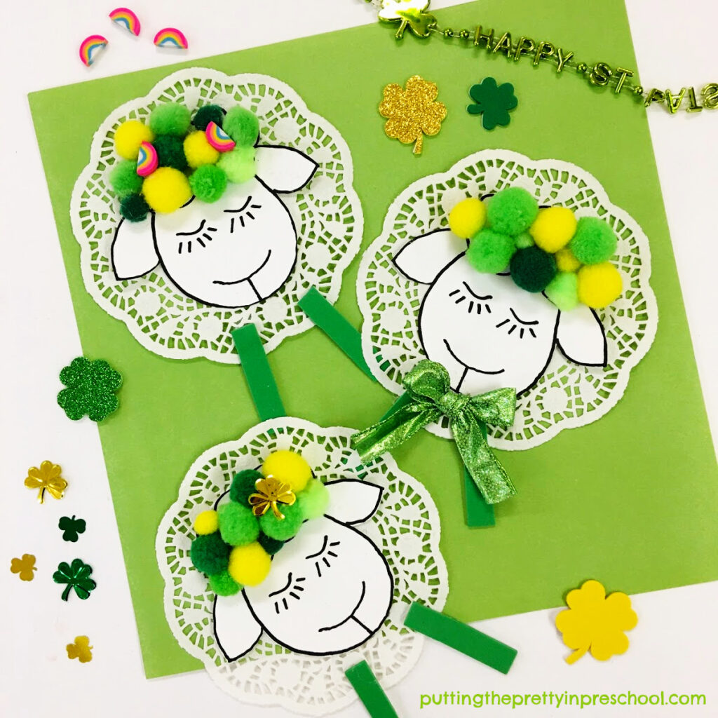 Cute doily and pompom sheep craft perfect for St. Patrick's Day or spring.