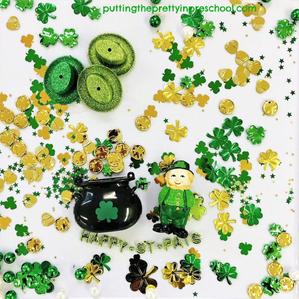 There is plenty of gold for the leprechaun to collect in this shamrock confetti-based St. Patrick's Day sensory tray.