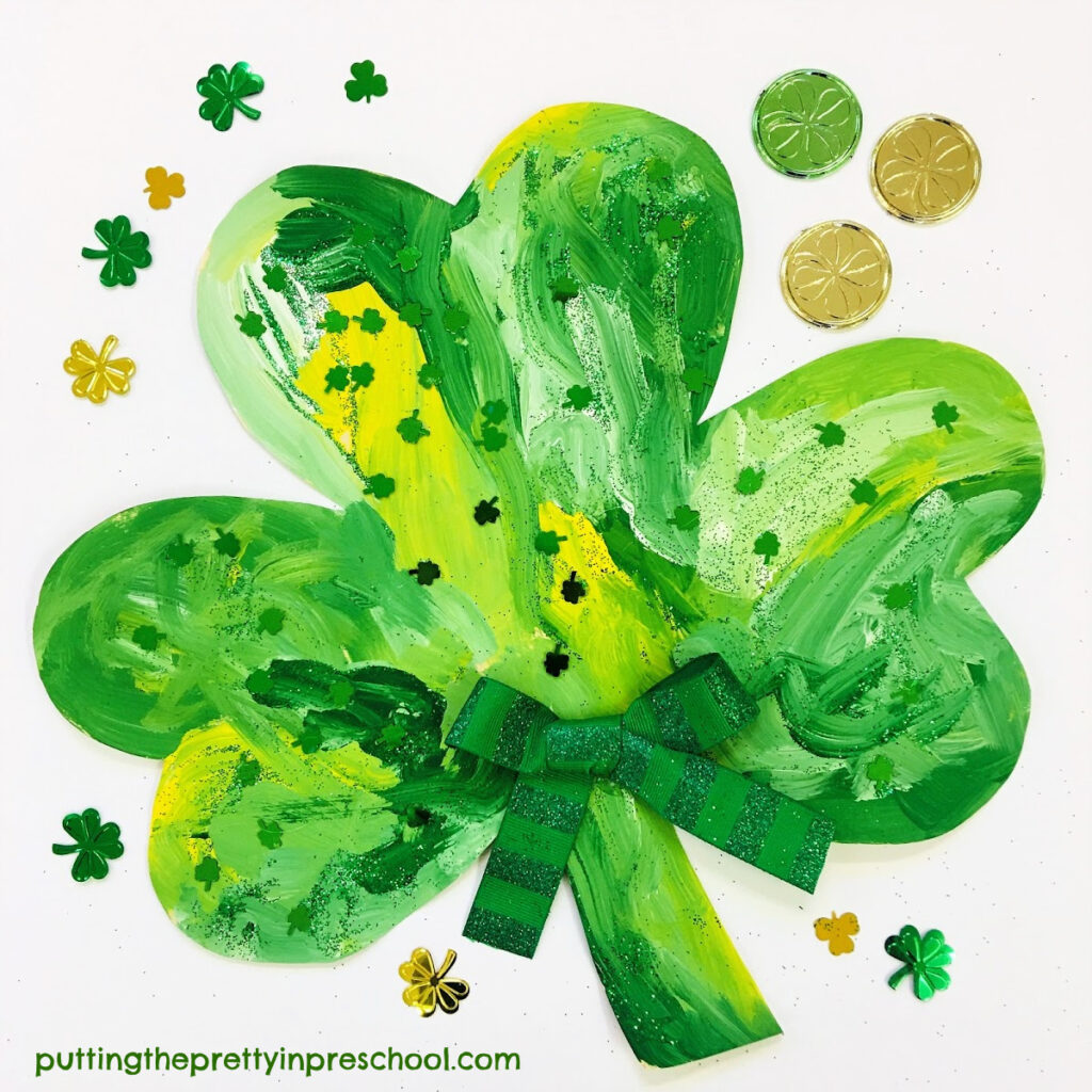 Painted shamrock art activity. An all-ages color mixing invitation.
