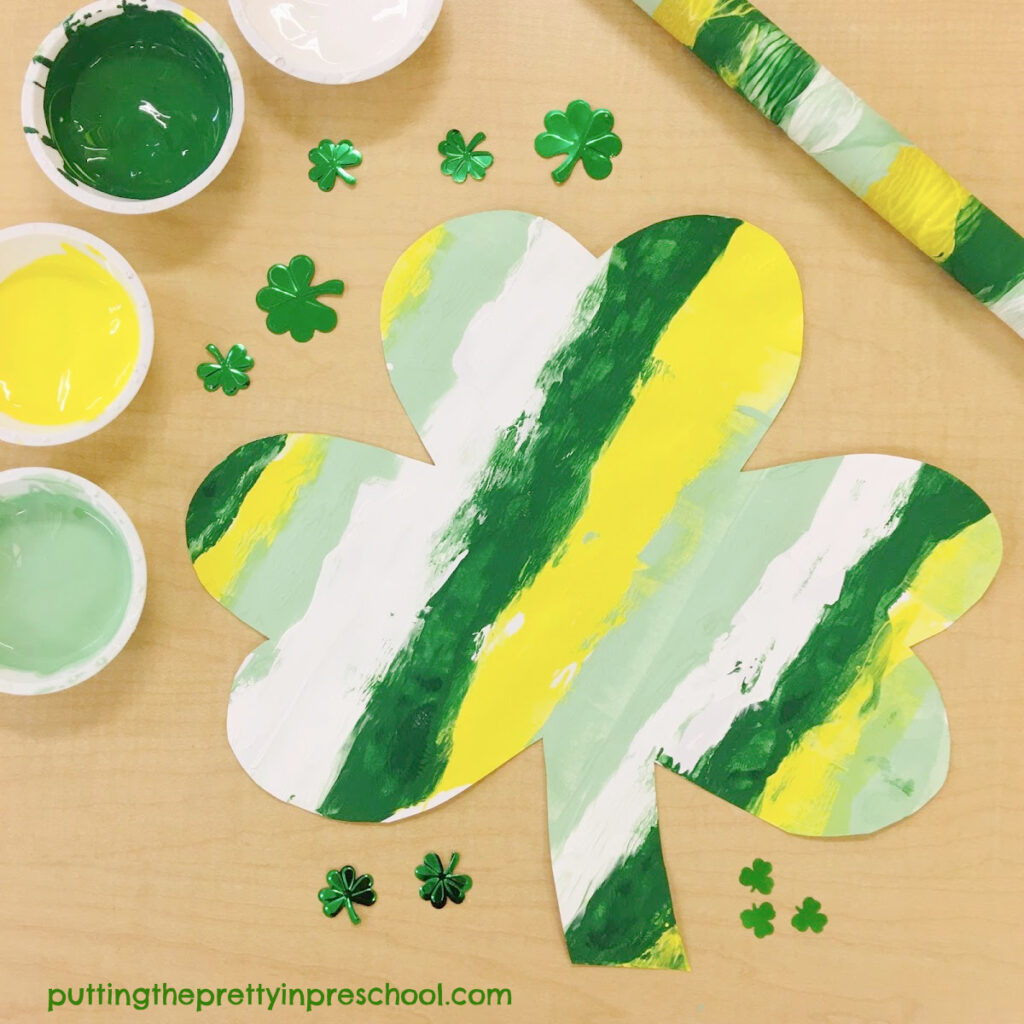 Rolling pin art on shamrock shapes.