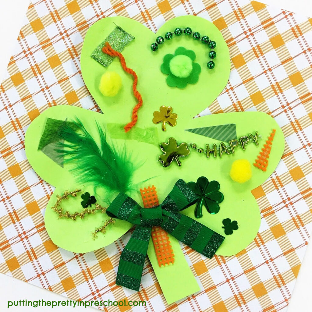 Shamrock collage with rust, yellow, and green textured craft supplies.