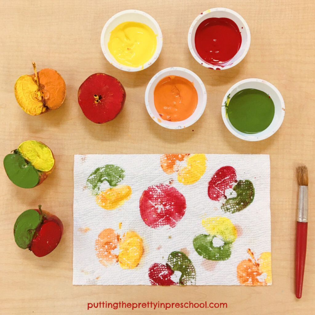 Make two-colored apple prints on absorbant paper towel.