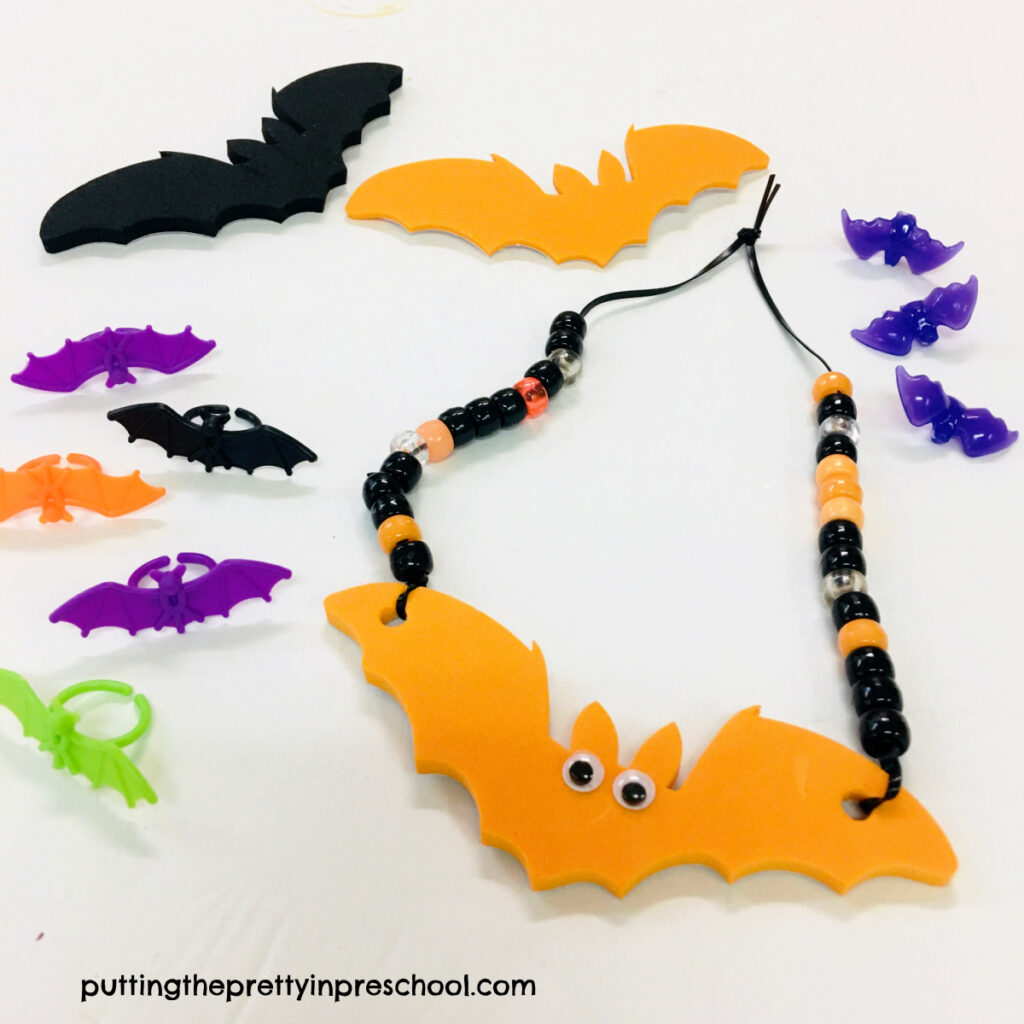 Children will love to craft and wear this easy-to-make bat necklace.