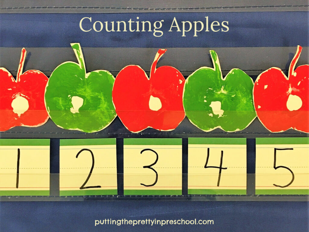 Cut apple paint prints used in fingerplays and counting activities.