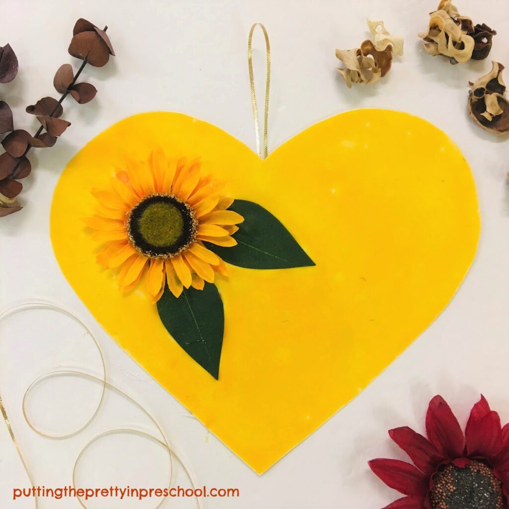 A bright and cheery sunflower heart craft for the whole family.