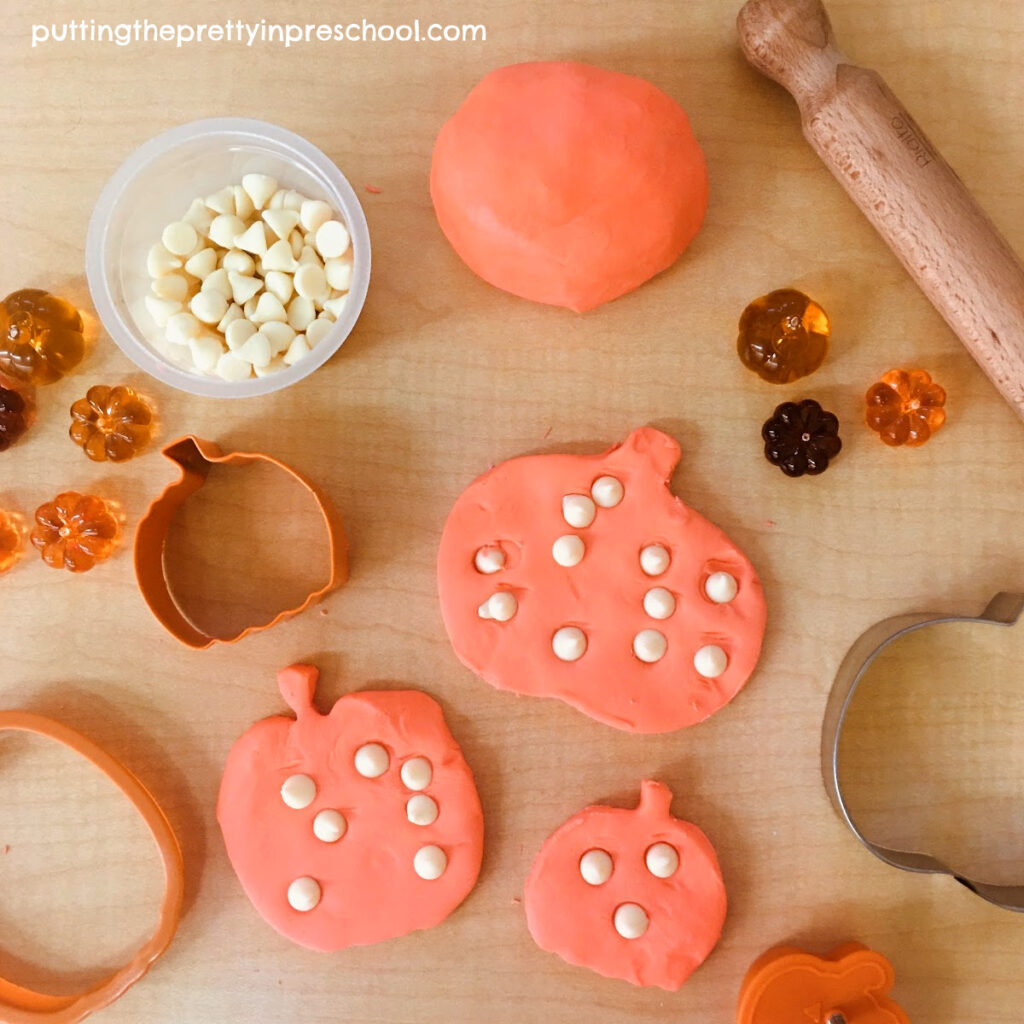 Creating pumpkins with warts is easy and fun with white chocolate chips and an edible playdough recipe.