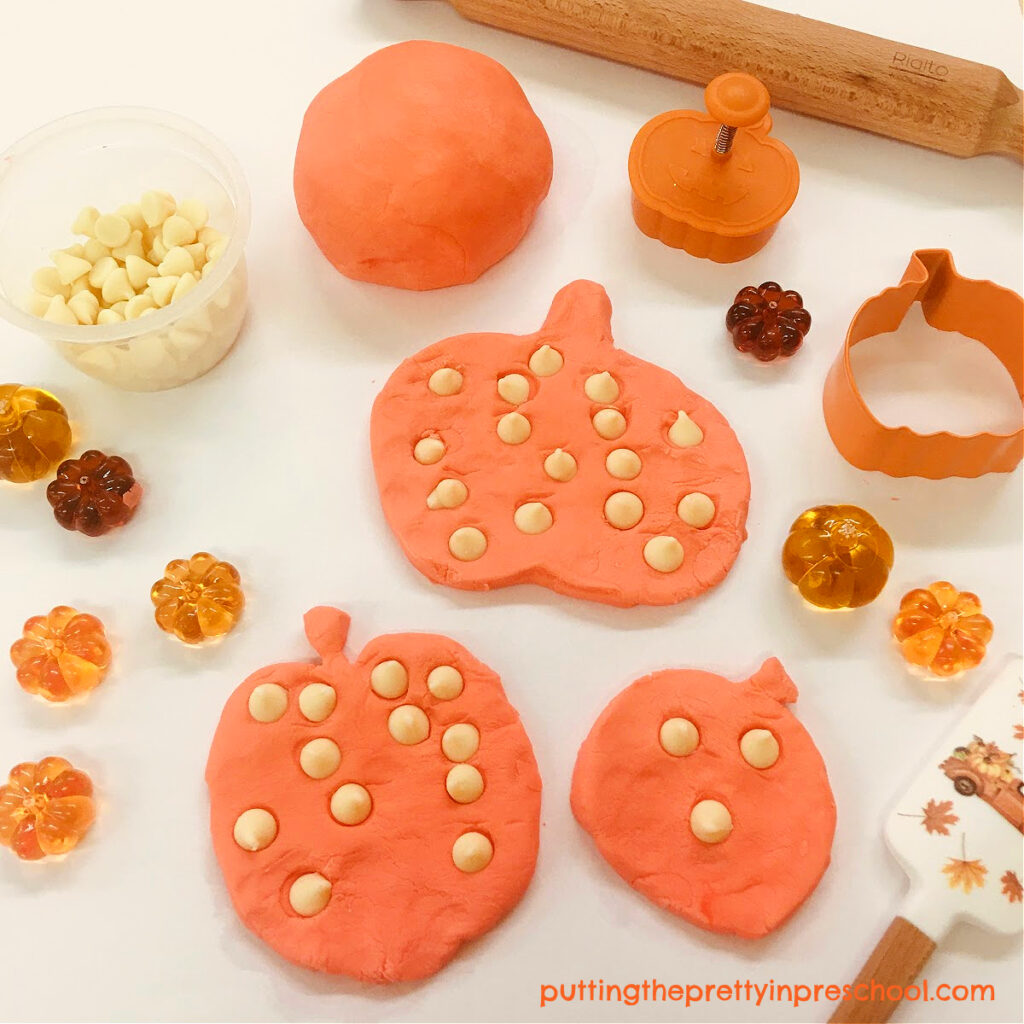 Creating warty pumpkins is easy and fun with white chocolate chips and an edible, no-cook playdough recipe.