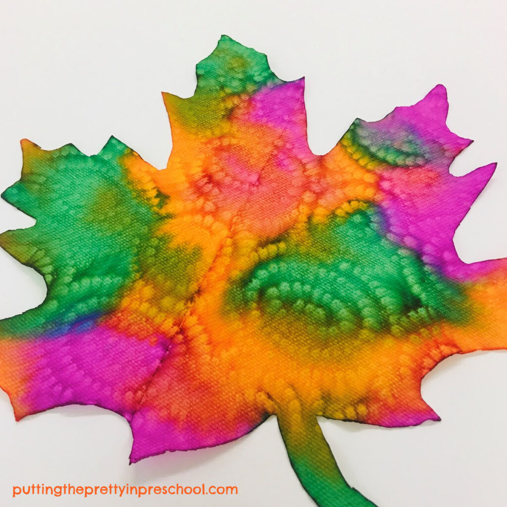 Eye-catching leaf painting activity using an eye dropper technique.