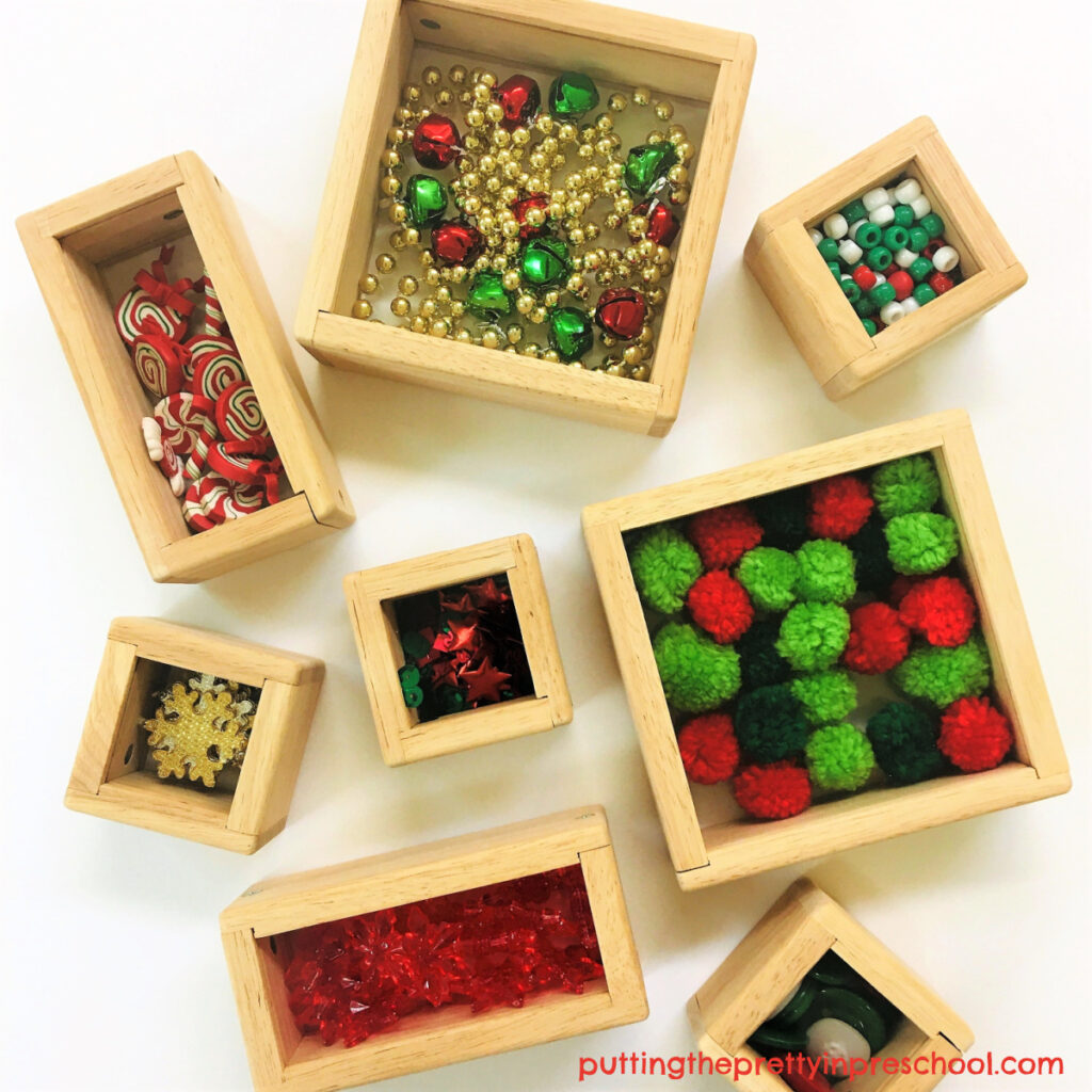 Seasonal loose parts are perfect to use with these see-through Christmas treasure blocks.