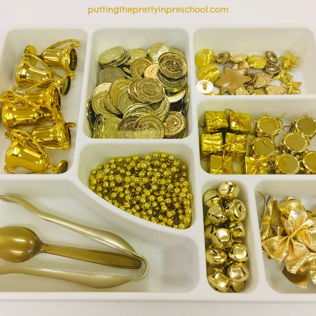 New Year's metallic gold sensory bin loose parts tray.