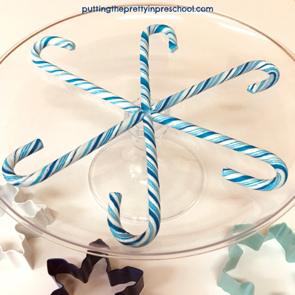 Let the science experiment begin with this blue candy cane snowflake!