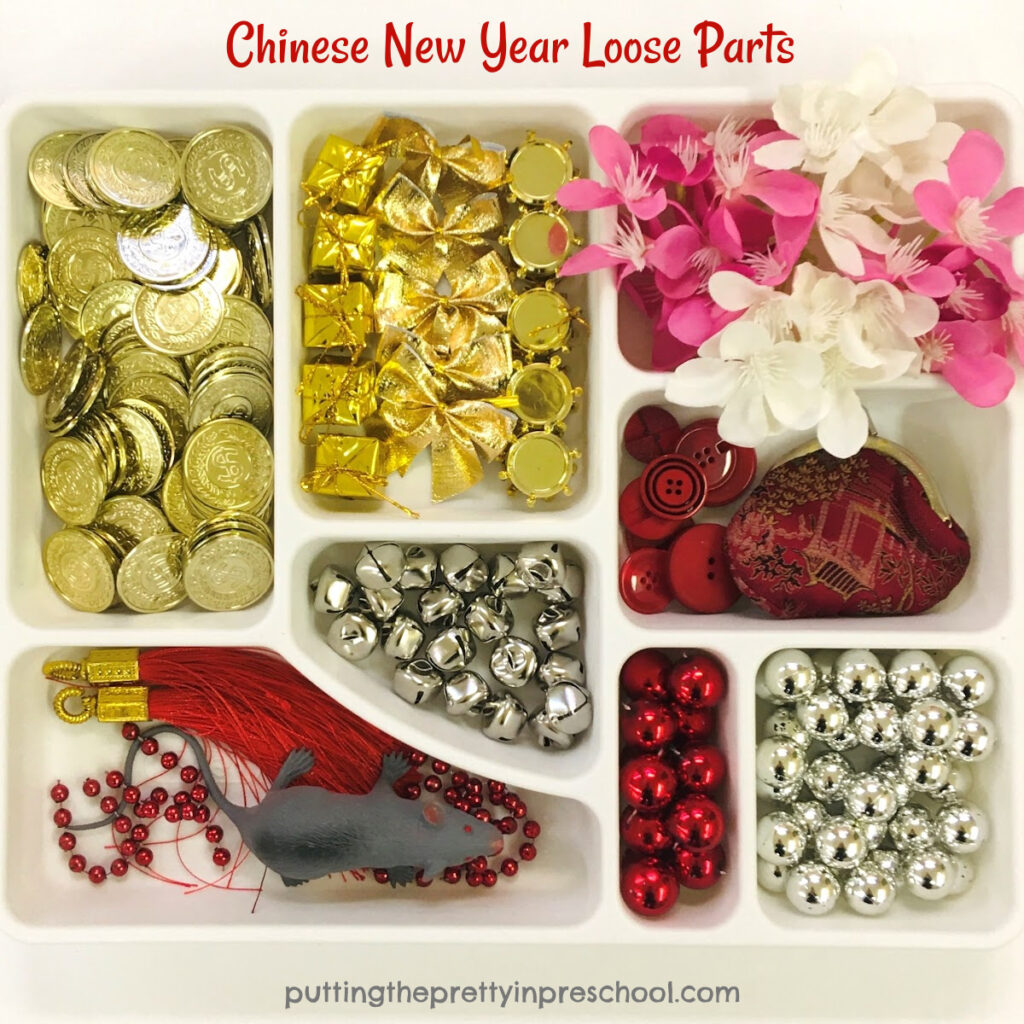 Loose parts for a Chinese New Year noodle bin with a "year of the rat" theme.