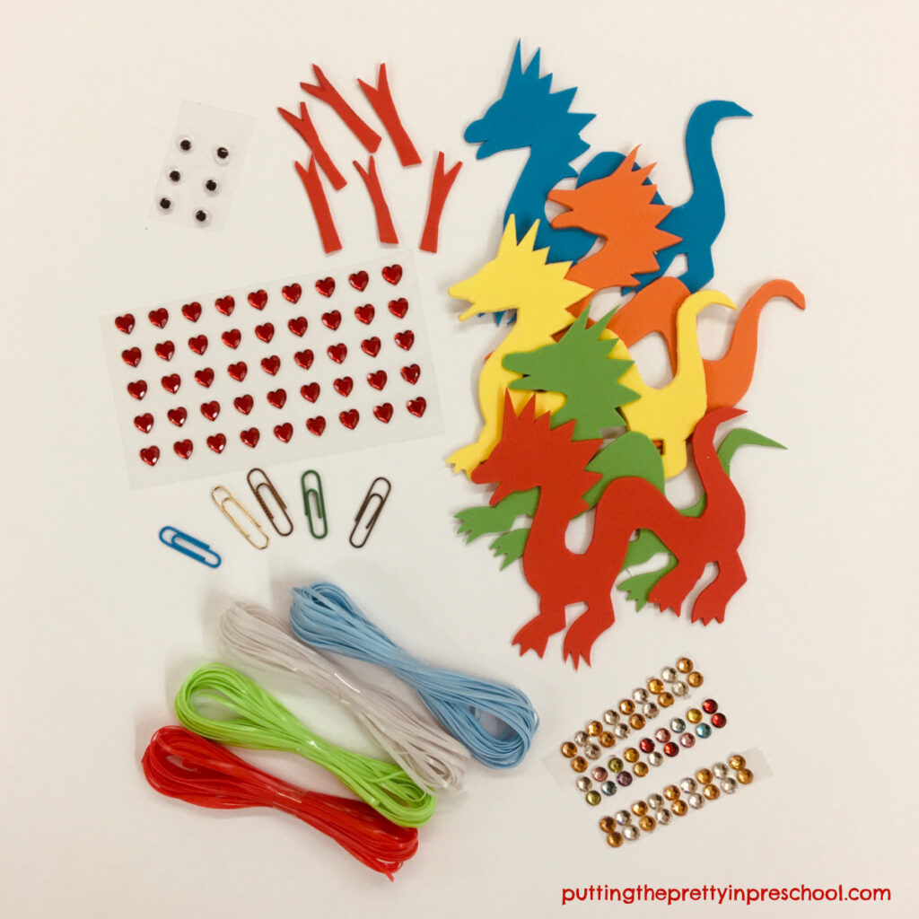 Craft supplies to make a dragon necklace craft your children will love to do.