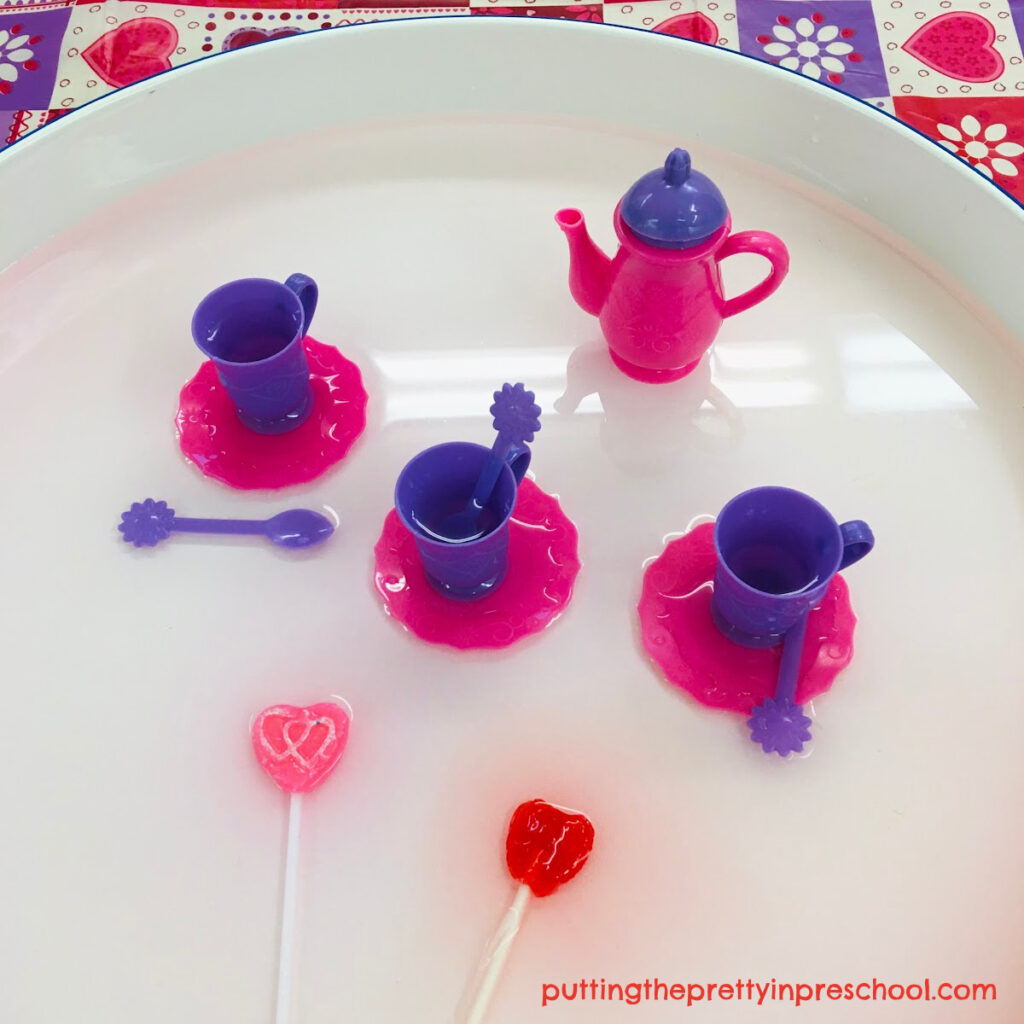A lollipop and tea set sensory bin your little learner will love to explore. This sensory bin is toatally taste-safe.