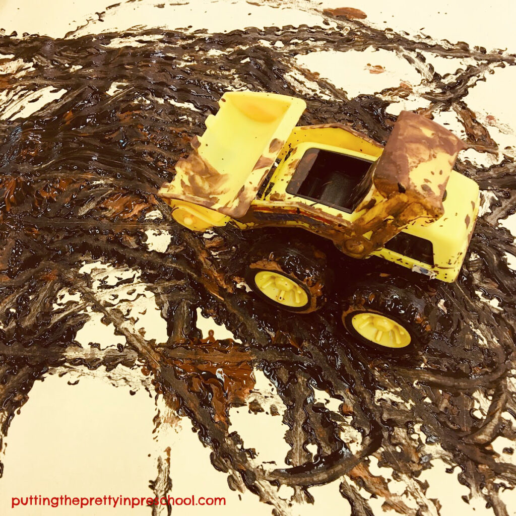 Your little learners will love this construction vehicle process art activity. They'll get to make lots of muddy tracks on paper.