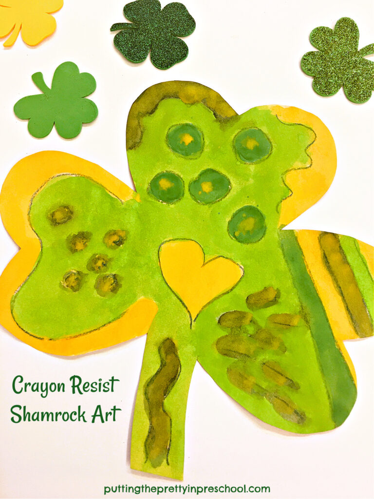 Offer this simple crayon resist watercolor shamrock activity that explores variety in line, shape, and color.