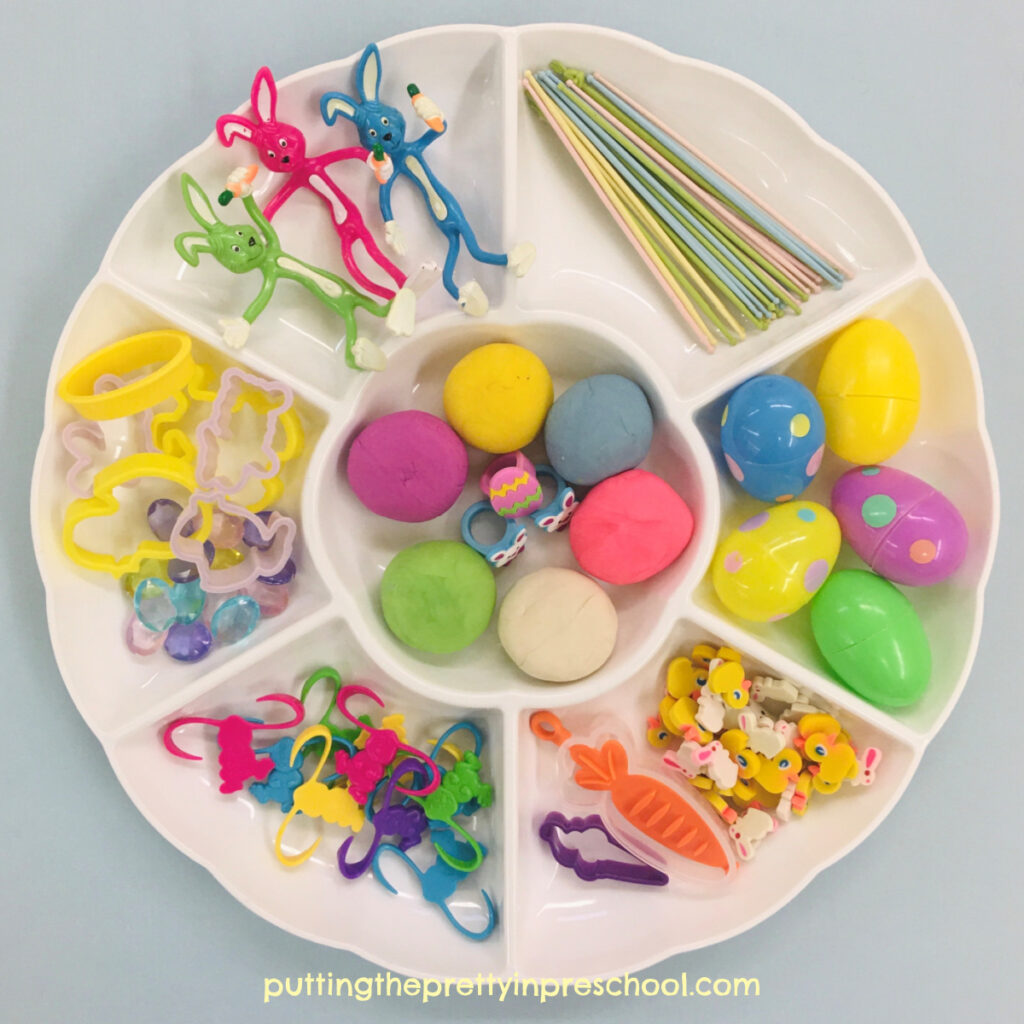 Colorful bunnies in all shapes and sizes are the highlight of this super fun Easter/Spring playdough tray.