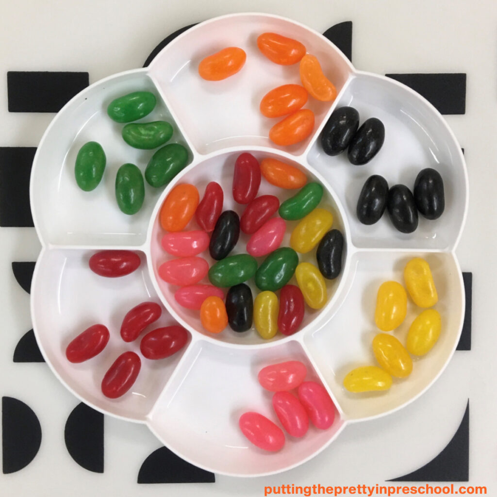 A flower-shaped paint palette makes the perfect tray to sort jelly beans by color.