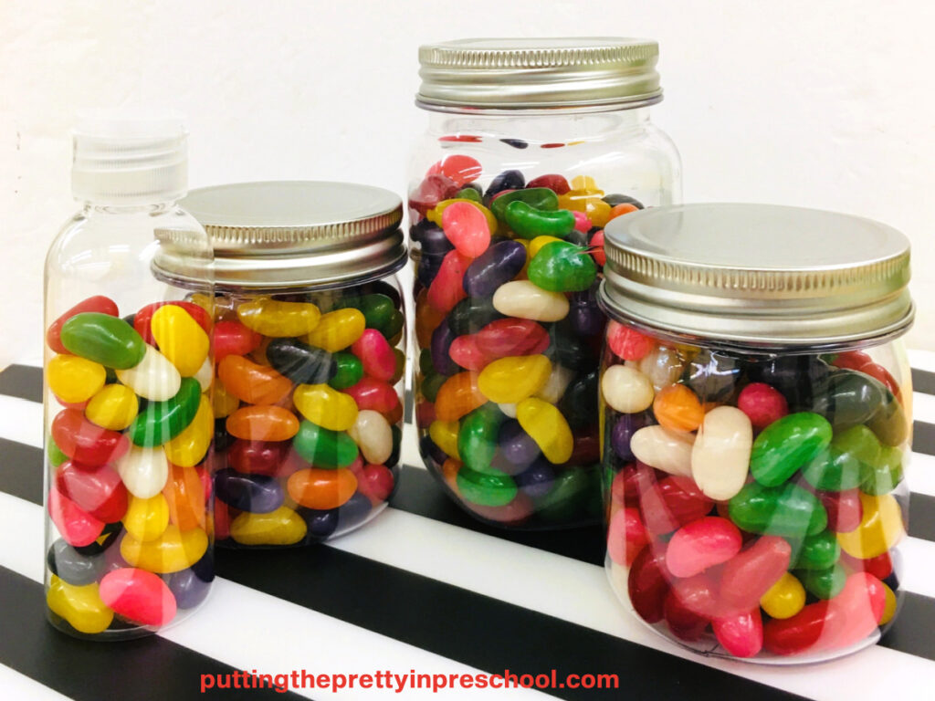 Store jelly beans in jars for a tablescape or food table display. Have a "Guess The Number Of Jelly Beans In The Jar" contest.