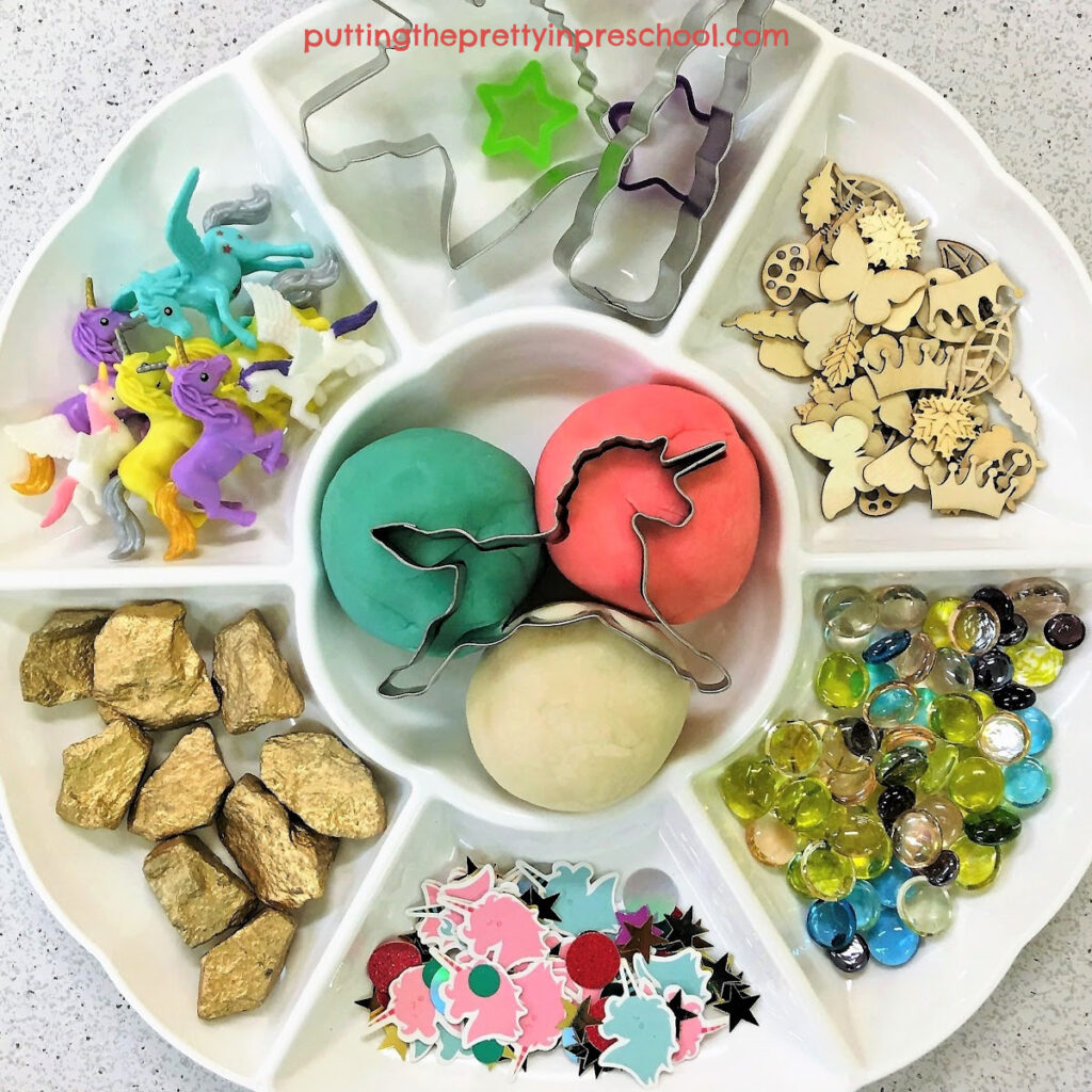 Set up this unicorn theme playdough tray in minutes. The best playdough recipes are featured.