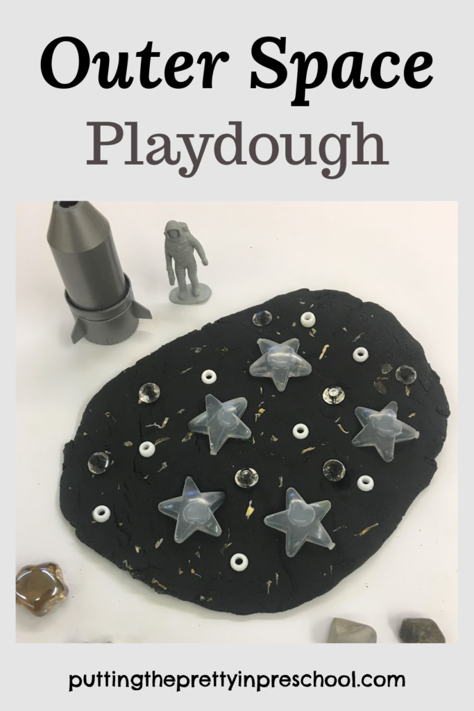 A sure-to-please outer space playdough setup.