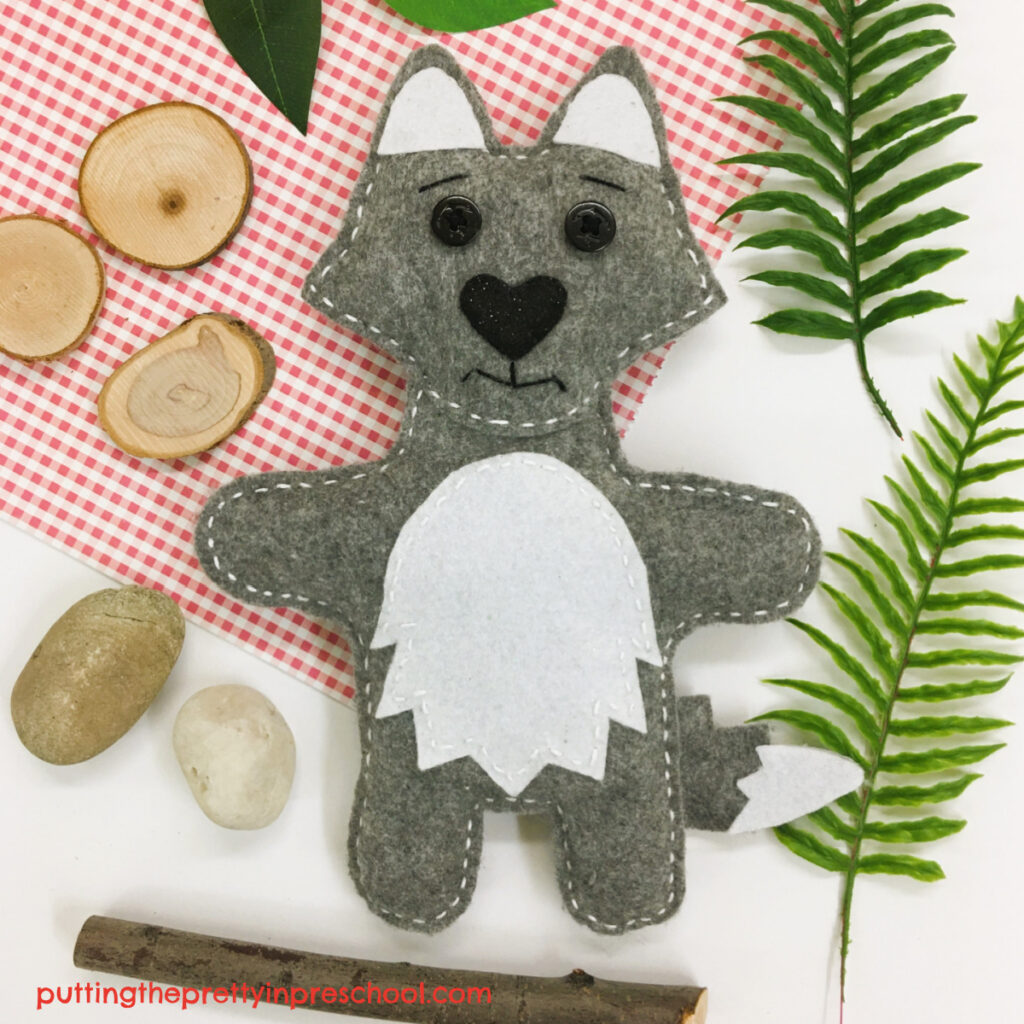 An adorable grey wolf softie sewing project that is easy to do. A free pattern and tutorial, wolf facts, and book suggestions are included.