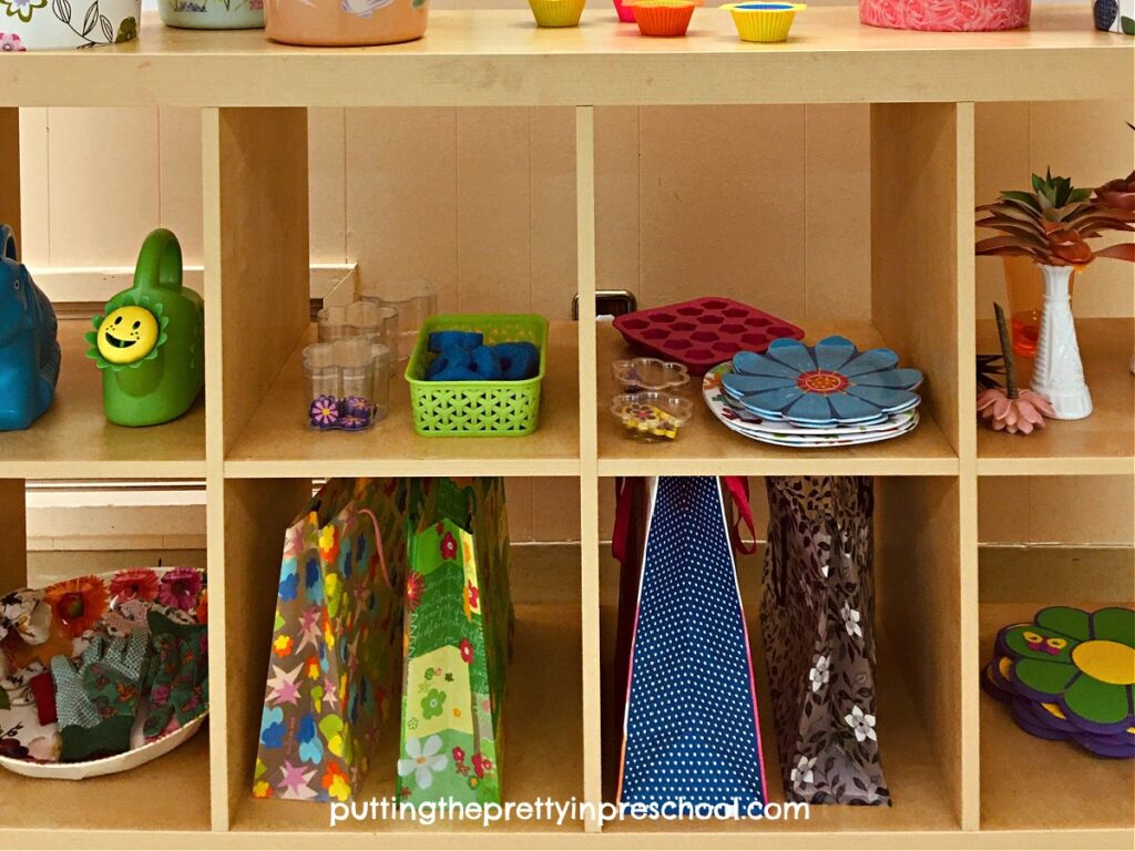 Flower stand accessories are housed perfectly on a shelf with casters.